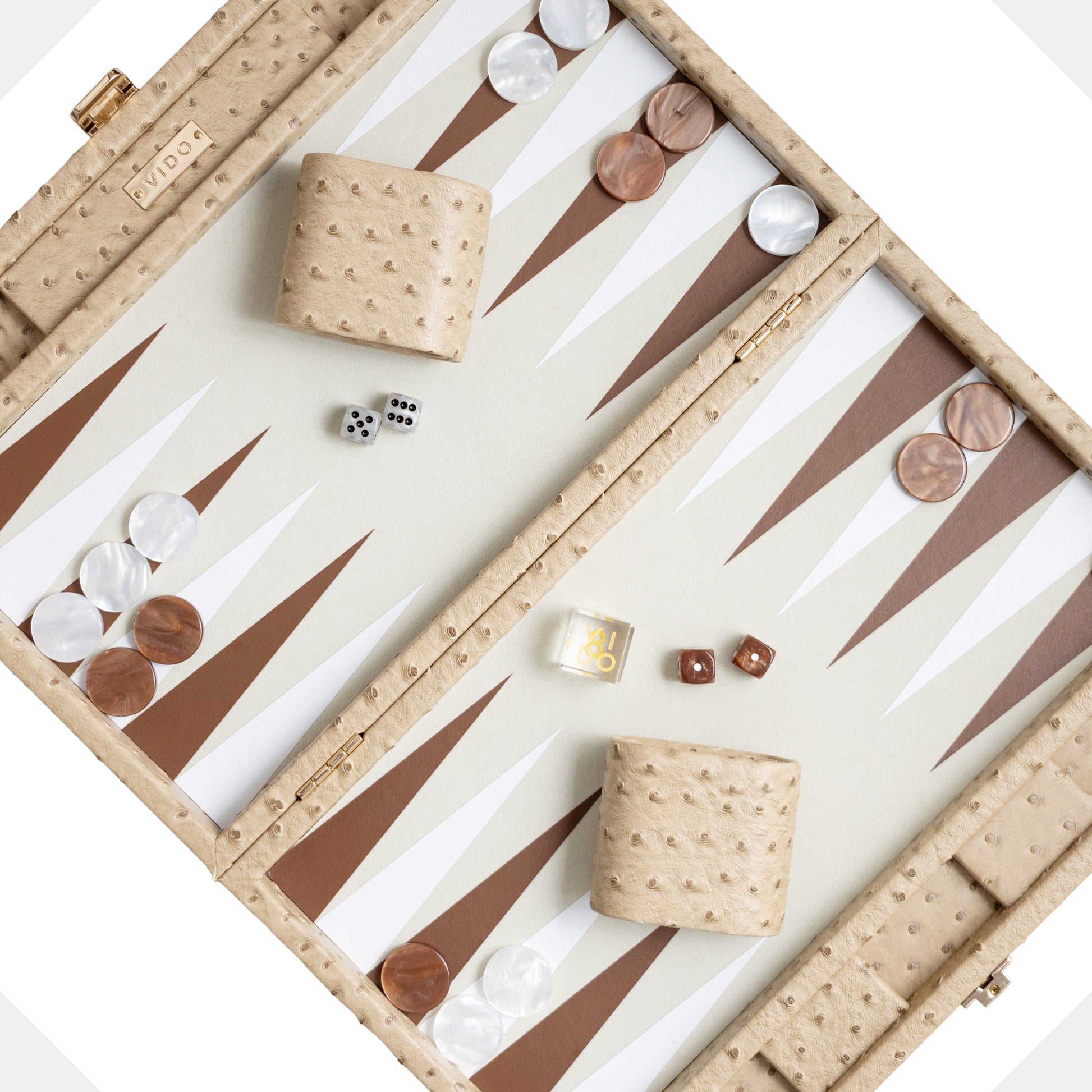 Backgammon set beige colour with pieces and dice on a white background by VIDO