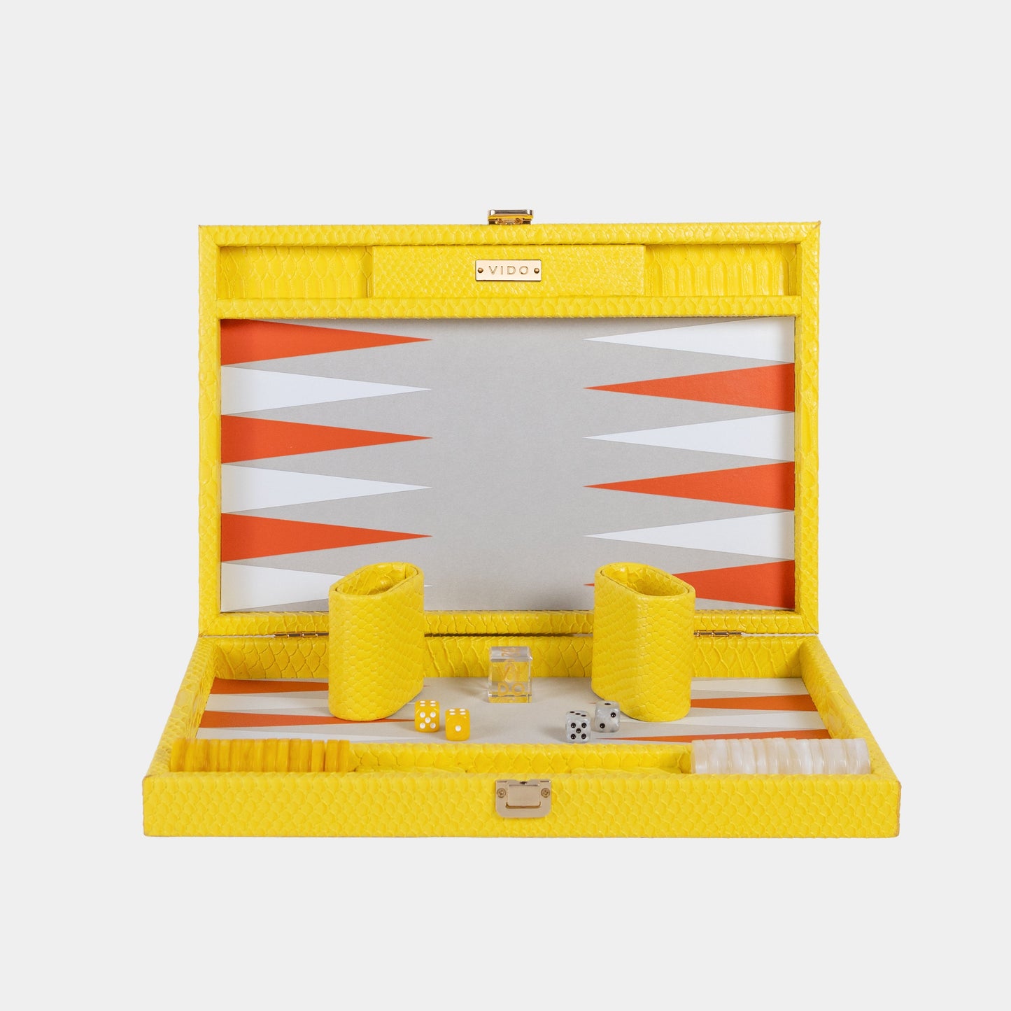 Yellow backgammon set with board and pieces on a white background by VIDO